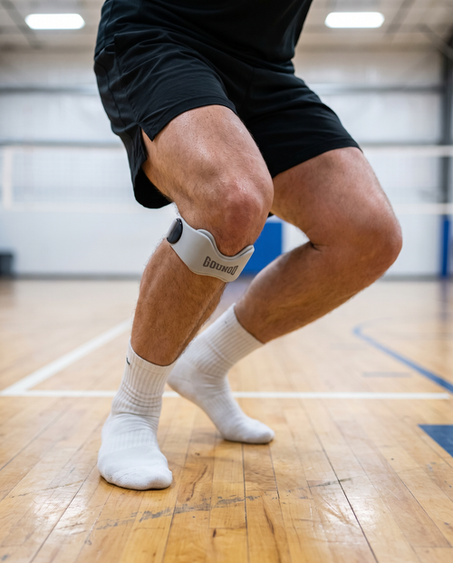 Sportif réalisant un squat avec une genouillère rotulienne Velox