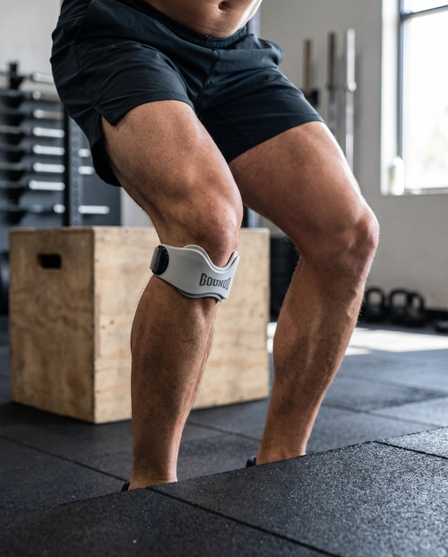 Sportif en séance de CrossFit avec une genouillère rotulienne Velox